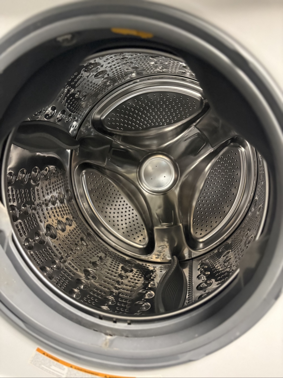Inside the stainless steel LG Mega front-load washer drum