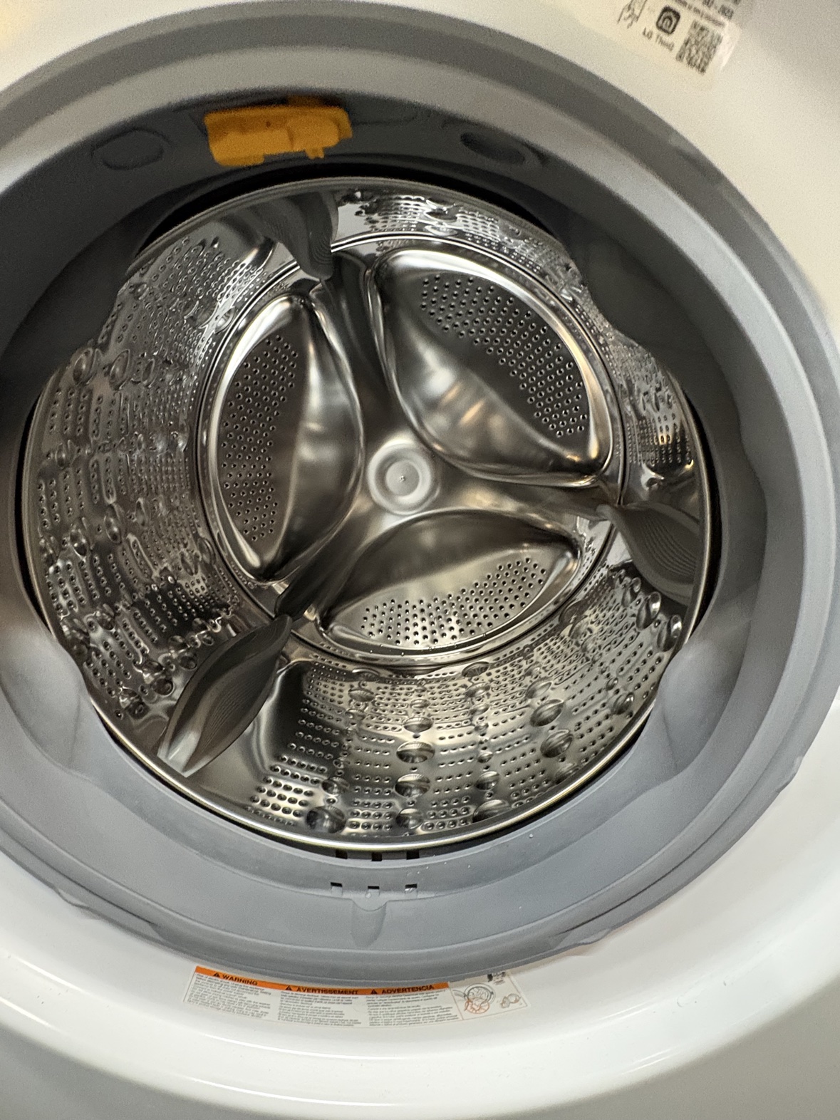 Inside the stainless steel LG ThinQ washer drum