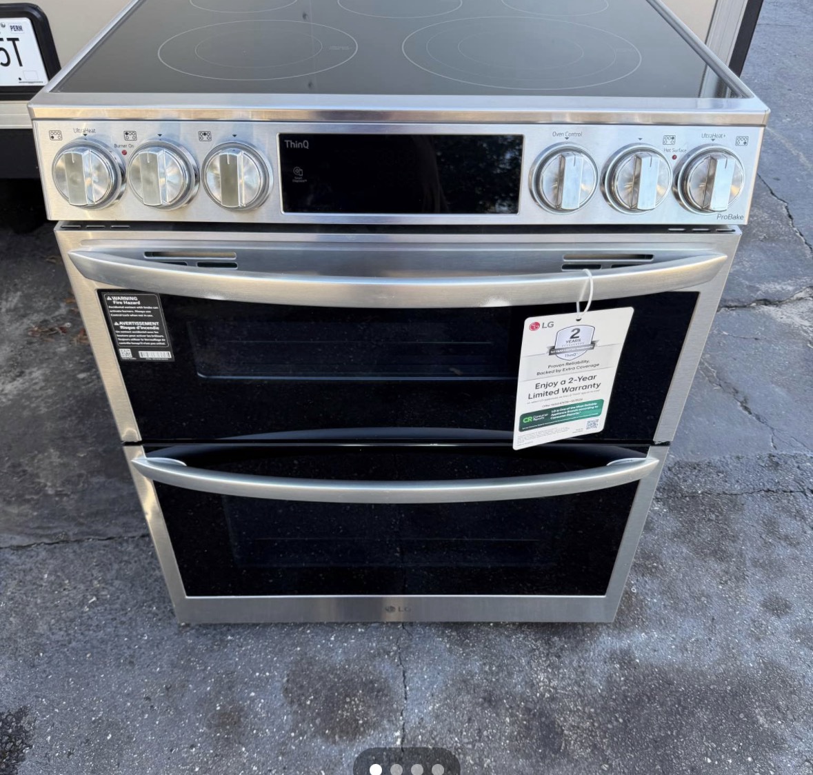 Original photo of the stainless steel LG ThinQ ProBake double oven electric range