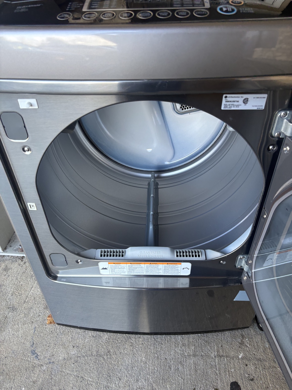 Original photo of the matching LG dryer with its door open