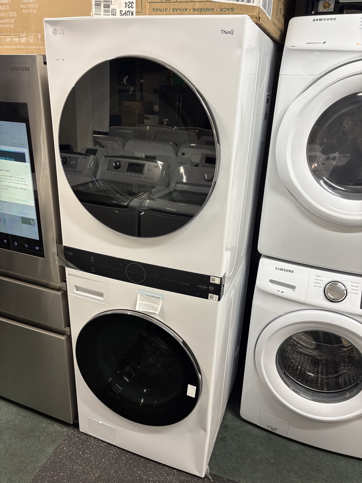 White LG ThinQ WashTower stacked washer and dryer unit, brand new
