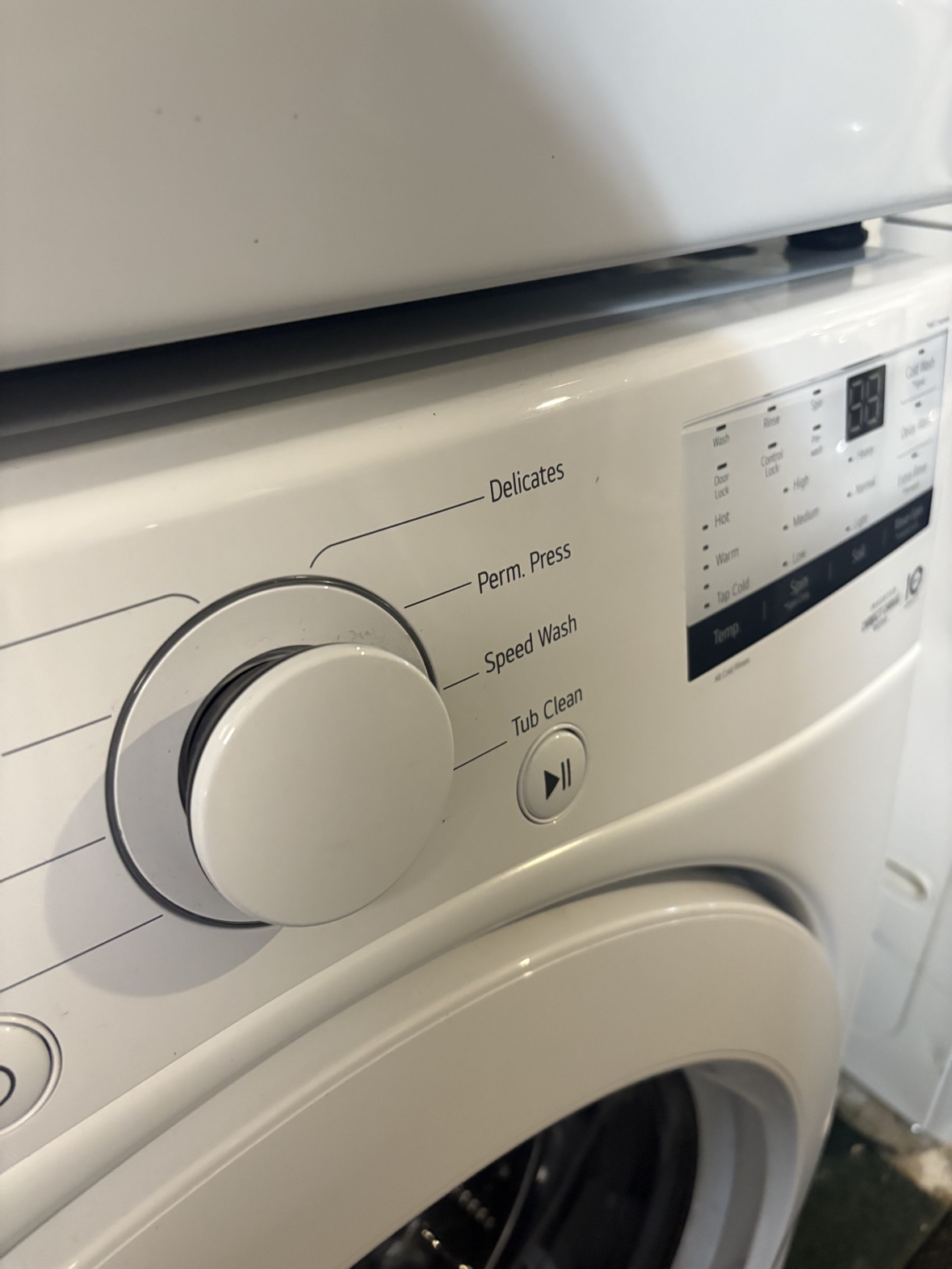 LG washer control dial and cycle panel close-up