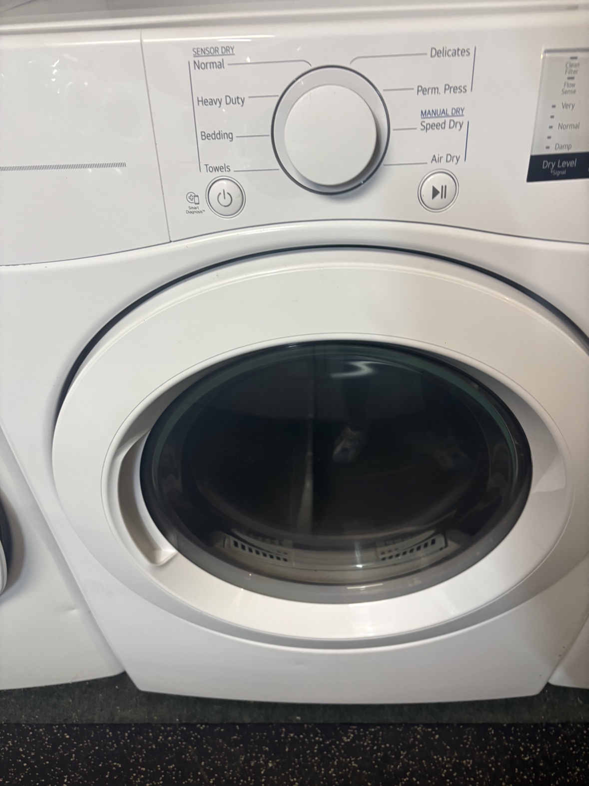 White LG dryer, front view