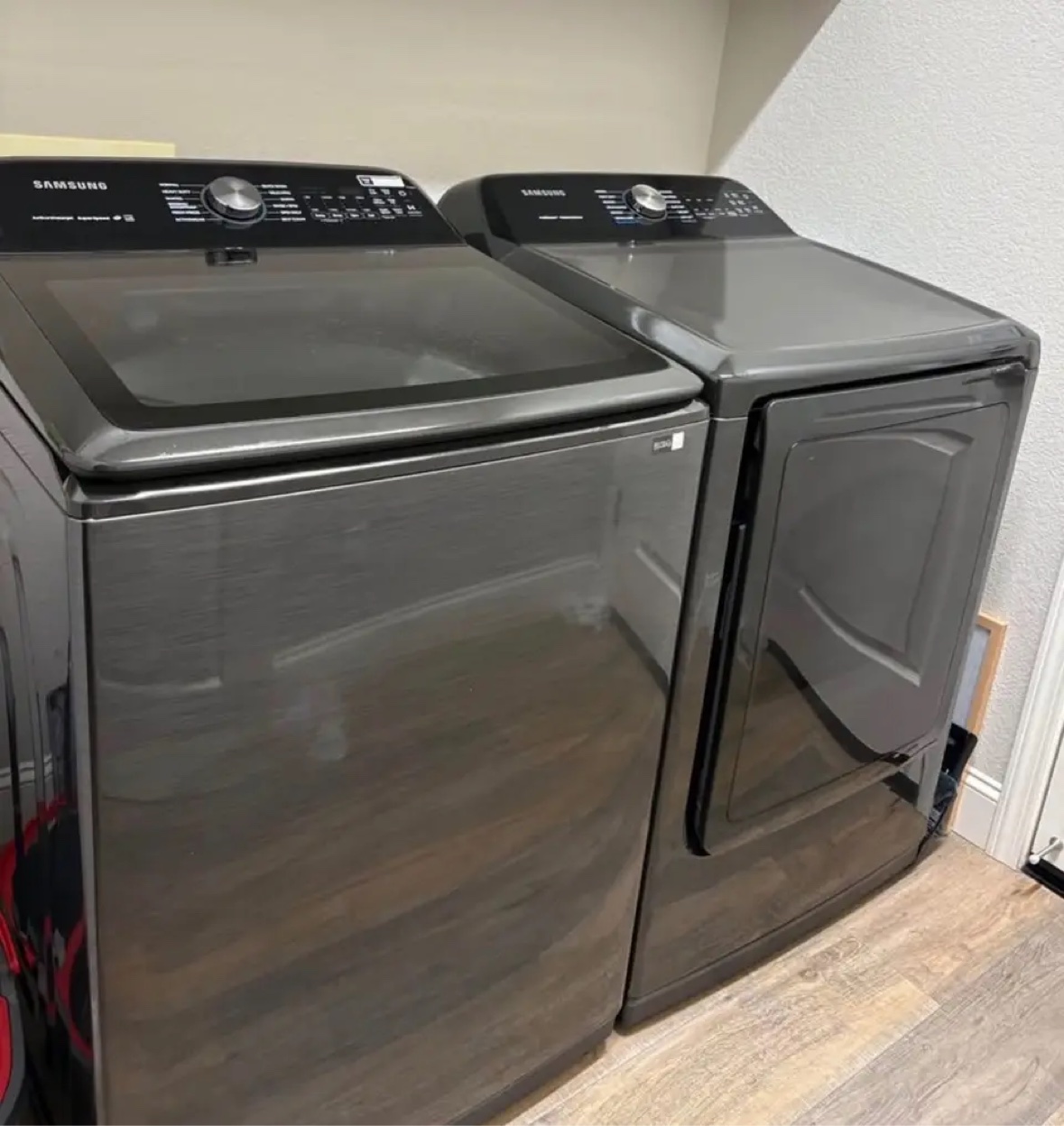 Original photo of the Samsung black stainless top-load washer and dryer set