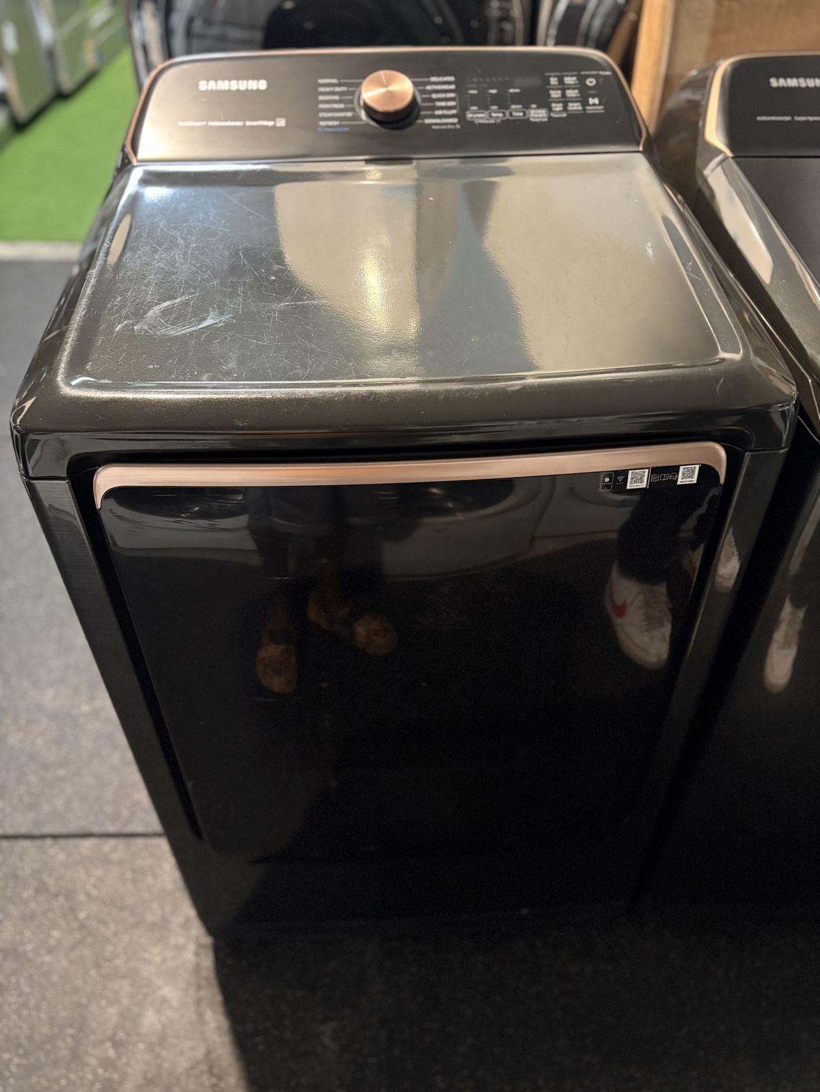 Matching Samsung black stainless dryer, front view